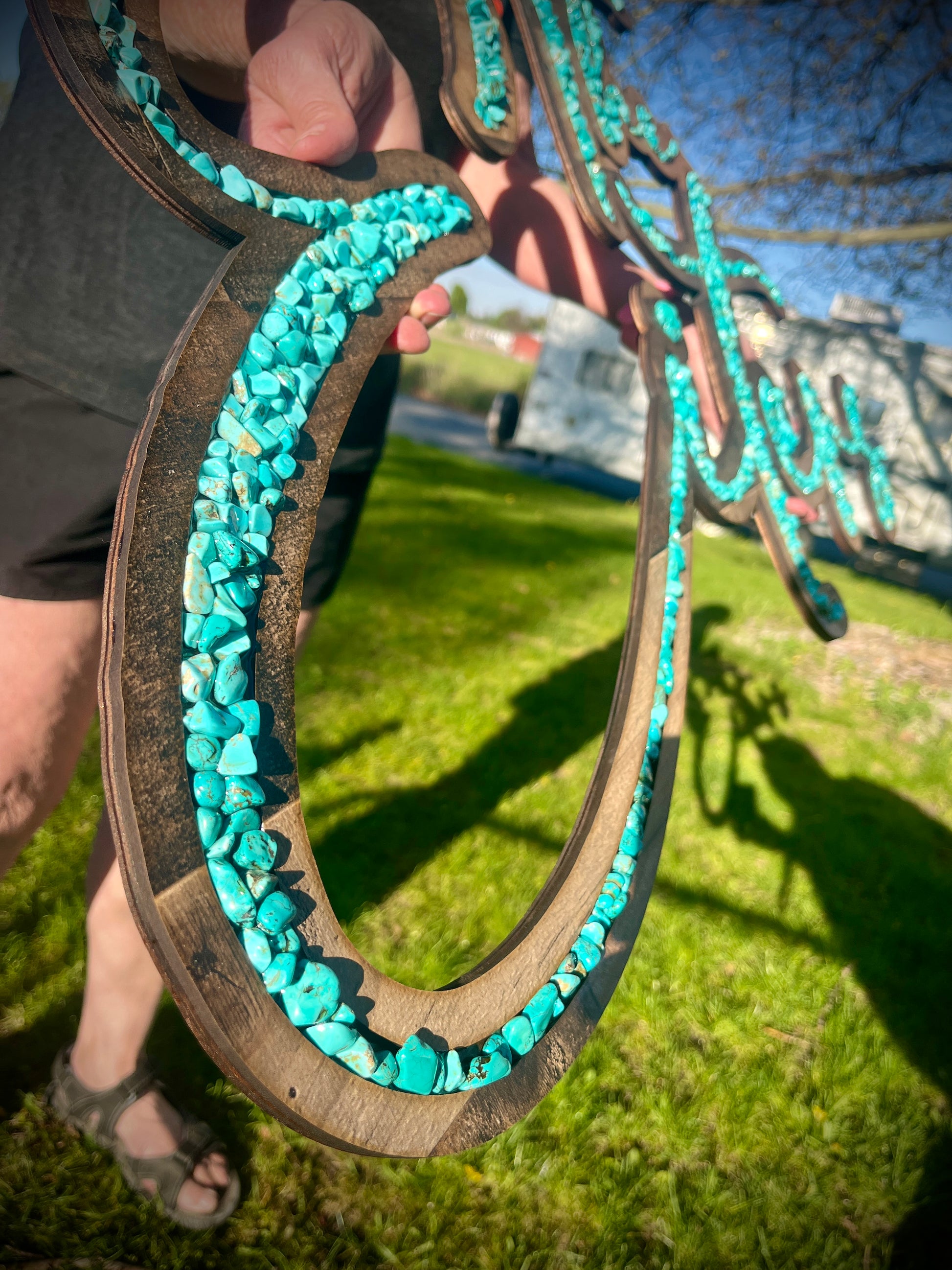 Turquoise inlayed laser cut sign