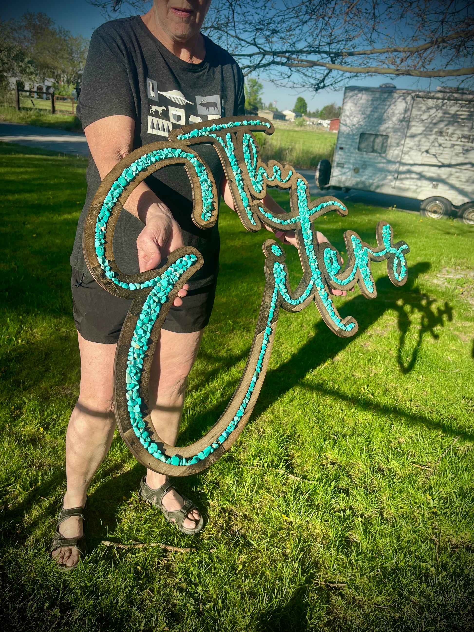 Turquoise inlayed laser cut sign
