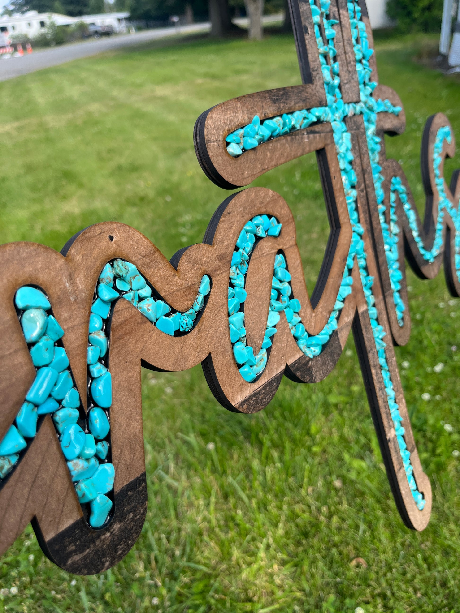 Turquoise inlayed laser cut sign