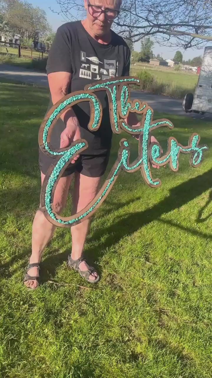 Turquoise inlayed laser cut sign